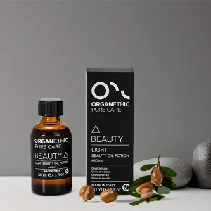 Organethic Pure Care Beauty Oil Potion Light. with argan seeds.