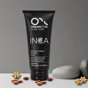 Remedy Mask container with scattered almonds and Inca Flowers.