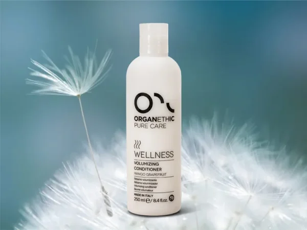 Volumising Conditioner standing on a Dandelion