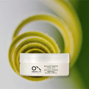 Jar of sculpt paste styling wax for styling and finishing hair.