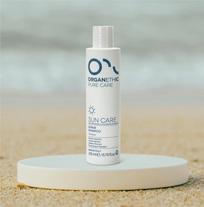 Bottle of suncare hair repair shampoo