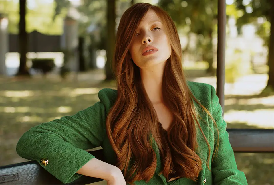 girl with long red hair for salon hair care